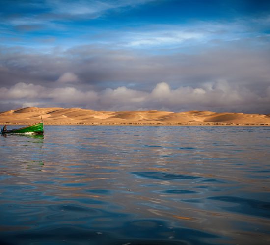 Landscape,In,Sahara,Desert,Maroc,With,Boat,On,Naila,Lagoon