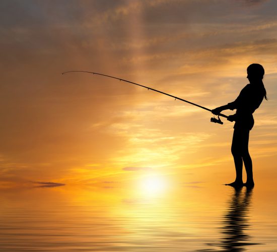 Silhouette,Of,Teenager,Girl,Fishing,At,Sunset